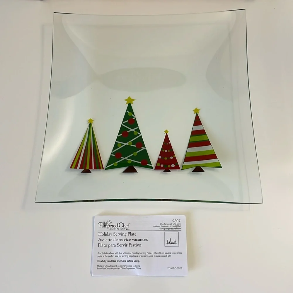 The Pampered Chef Holiday Serving Plate and‎ Set of 2 Holiday Spreaders.